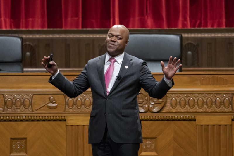 Image of Dr. Frederic Bertley speaking in the courtroom of the Thomas J. Moyer Ohio Judicial Center.